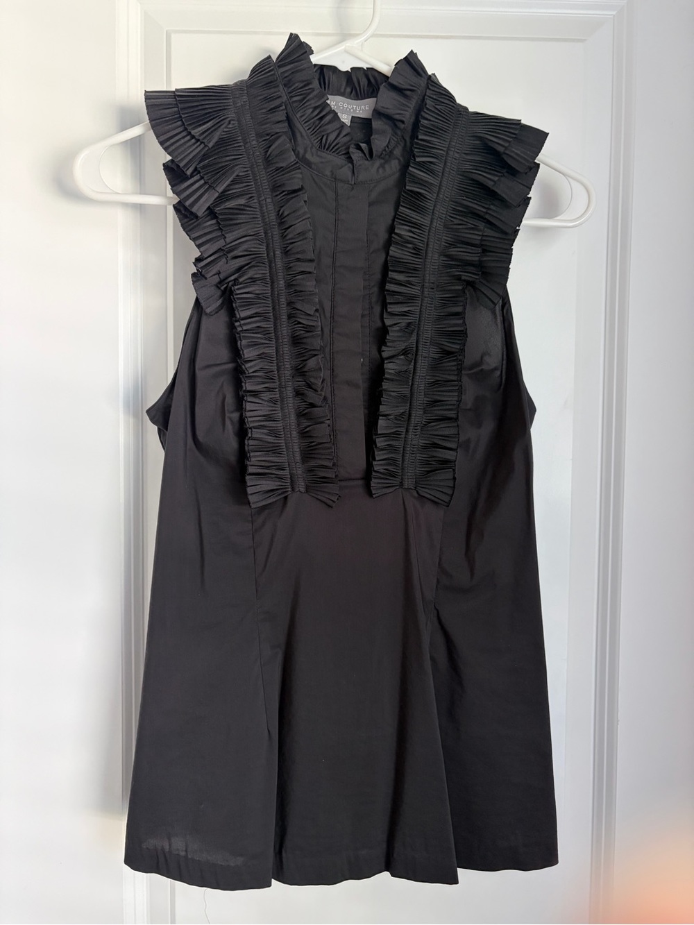 Sleeveless Black Ruffle-Front Top